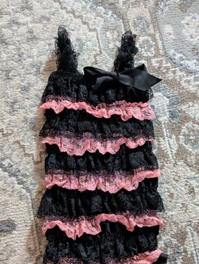 Black Lace Ruffle Romper with Pink Trim & Bow